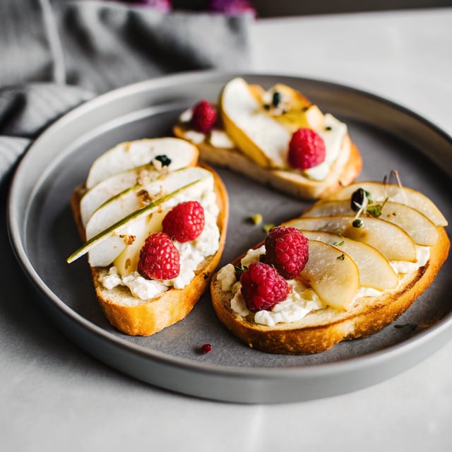 Pear, Raspberry and Goat Cheese Crostini