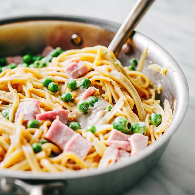 Ham and Peas Pasta with Garlic Parmesan Cream Sauce