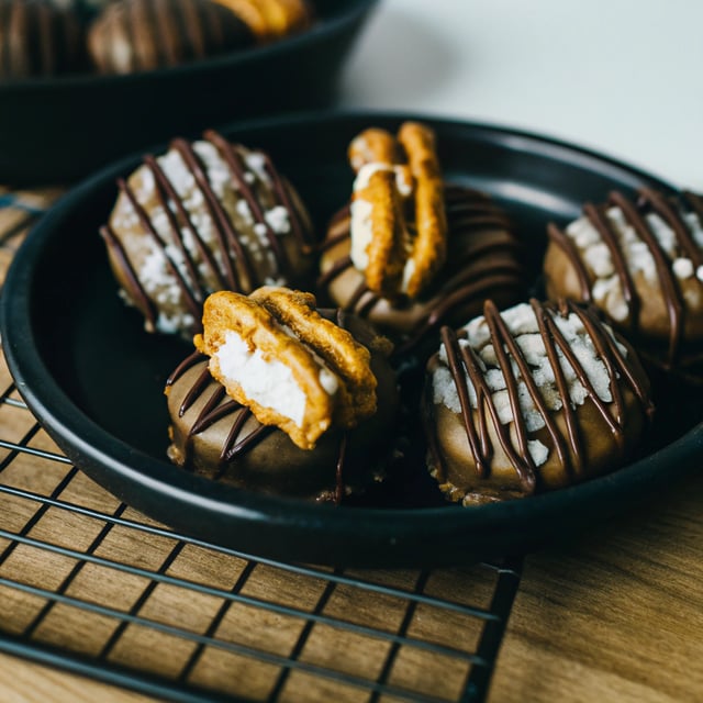 Chocolate Covered Pretzel Coconut Caramel Somoa Present Bites.